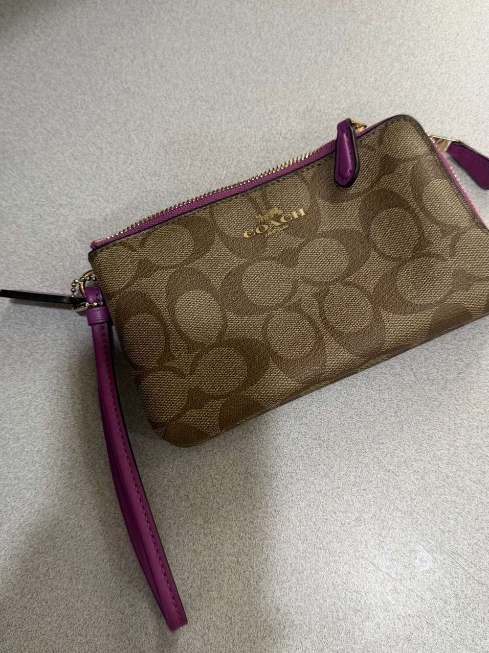 Coach Brown Signature Canvas Wristlet with Purple Trim